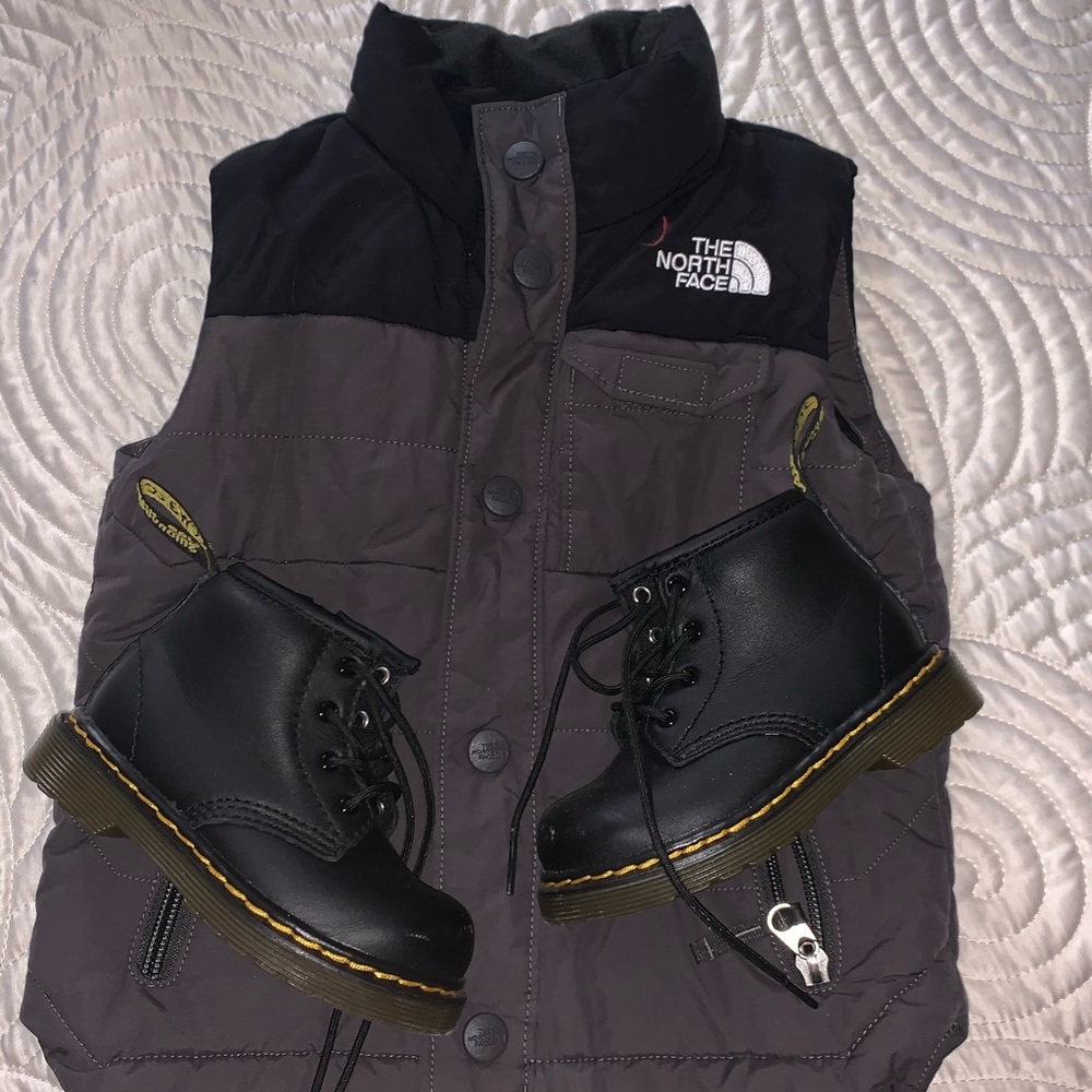 Toddler North face vest and Dr. martens